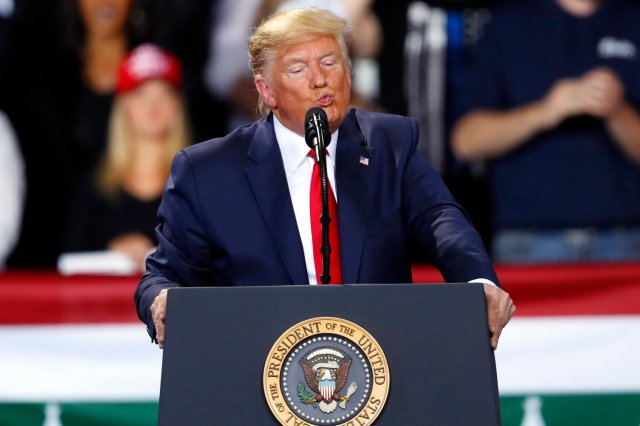 Queens native Donald Trump was impeached by the House of Representatives on Wednesday. AP Photo/Paul Sancya.